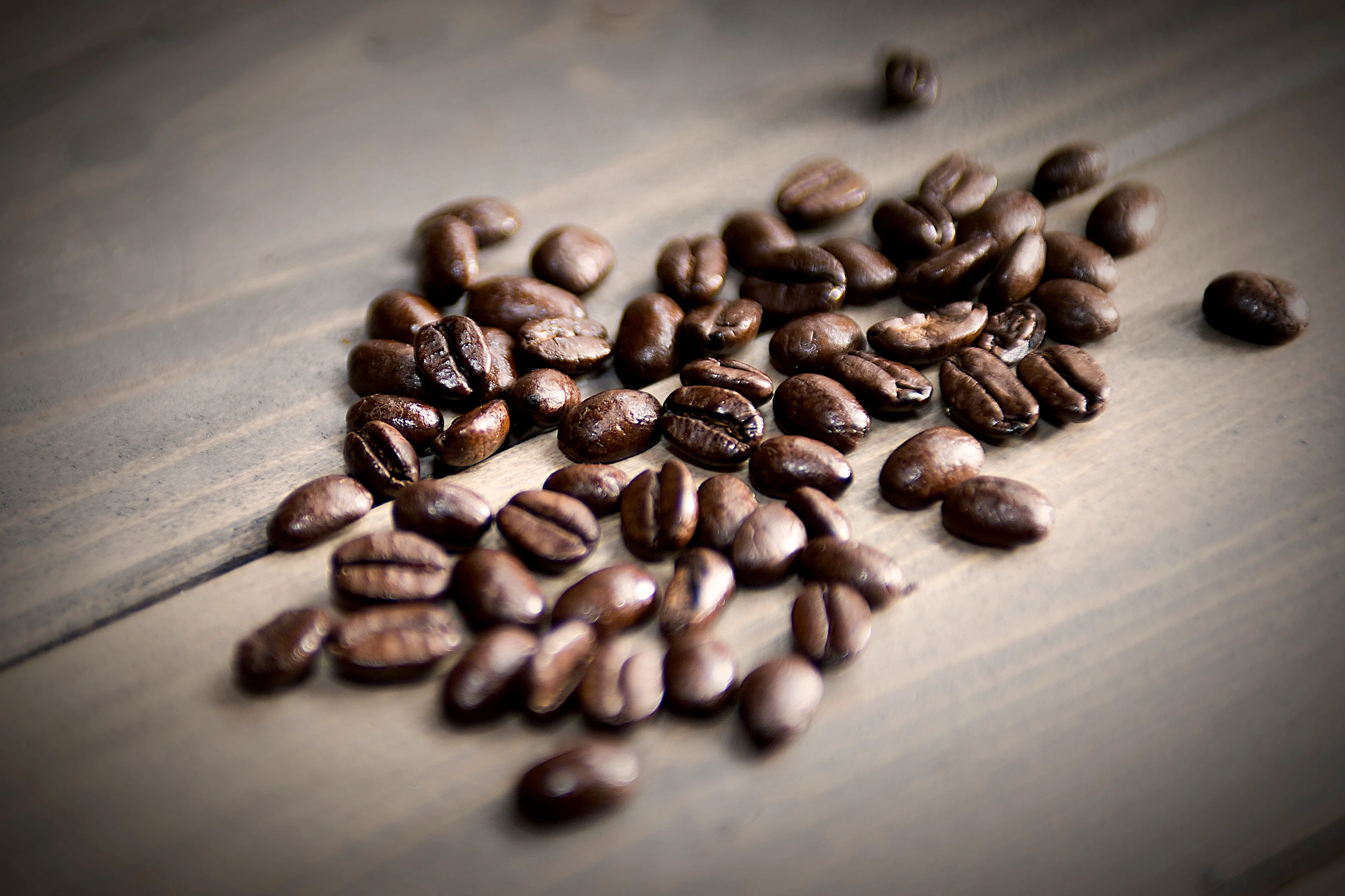 Roasted coffee beans on a table, German Coffee Association press photo
